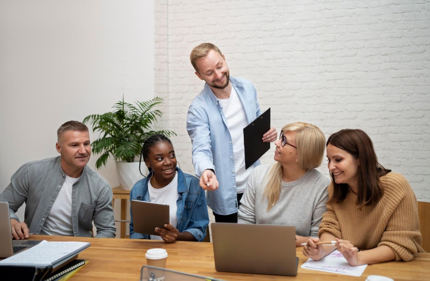 Testing professionals collaborating during workshop session